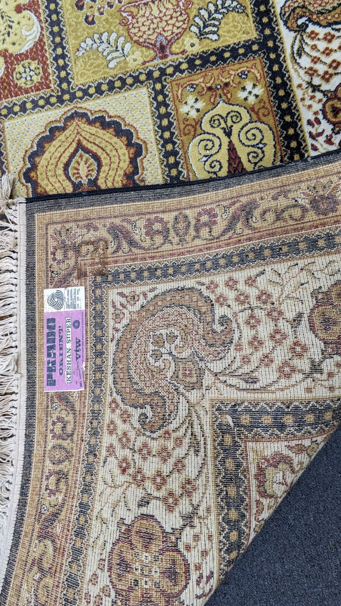 A Prado Orient 'Kashan Super' carpet with divided field of stylised flowers, peacocks and other motifs, multi-bordered, 372 x 275cm